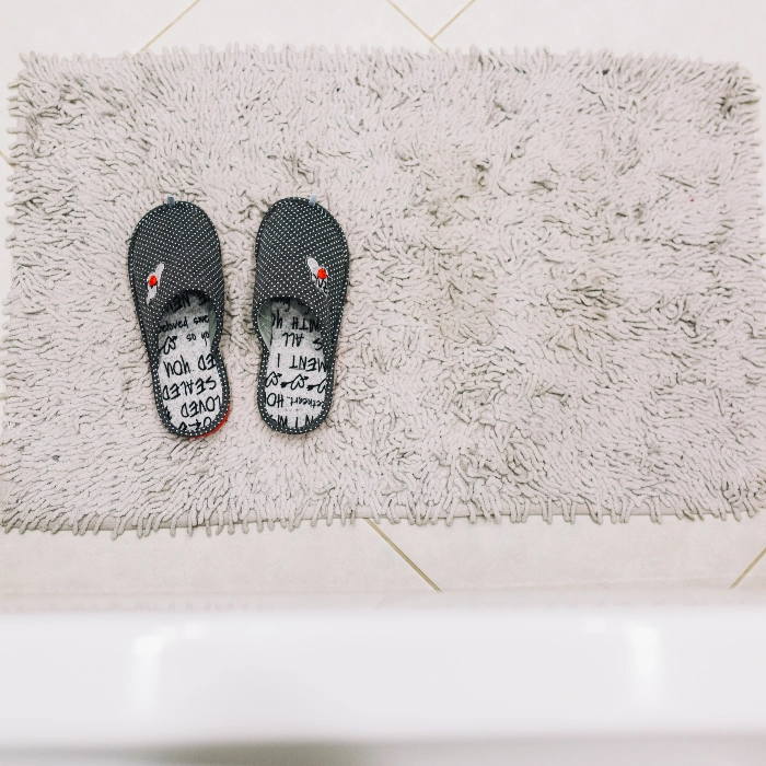from-slippers-shaggy-rag Bath Mat - Image 1